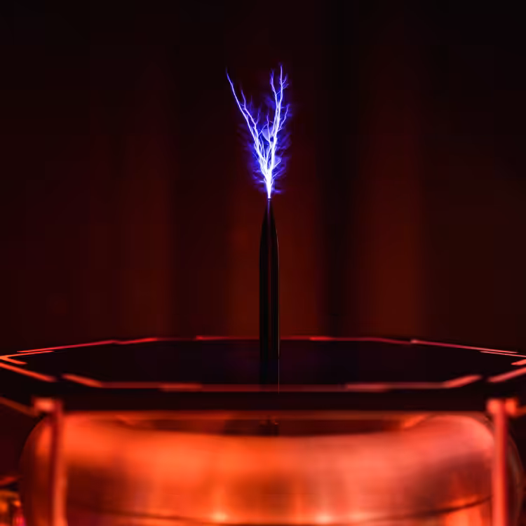 BioCharger Platform Zoomed Into the Arc rod with a Spark Coming out of the Top