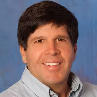 Jim Girard-Research and Development of the BioCharger Smiling