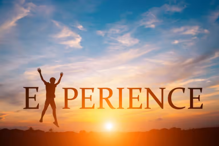 Experience Text Over the Sunset With Man Jumping With His Arms and Legs Wide Open Instead of Letter X
