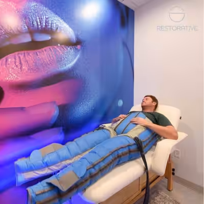 Man Lying in a Pressotherapy at The Covery Wellness Spa and Skin Care Clinic