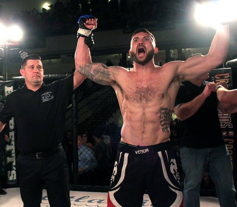 MMA Judge Holds Sean Lally's Hand Up After His Victor