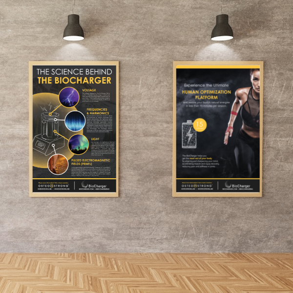 Two OsteoStrong and BioCharger Posters on a Concrete Wall Lighted With Chandeliers