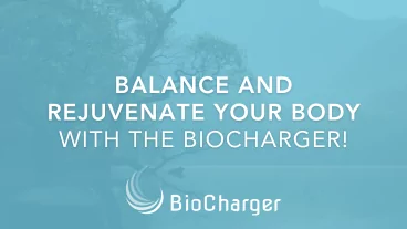 Balance and Rejuvenate Your Body with the BioCharger Text on a Blue Background with a Tree