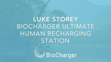 Luke Storey bioCharger Ultimate Human Recharging Station Text on a Blue Background with a Tree