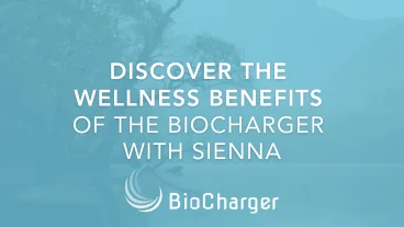 Discover the Wellness Benefits of the BioCharger with Sienna Text on a Blue Background with a Tree