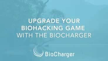 Upgrade Your Biohacking Game with the BioCharger Text on a Blue Background with a Tree