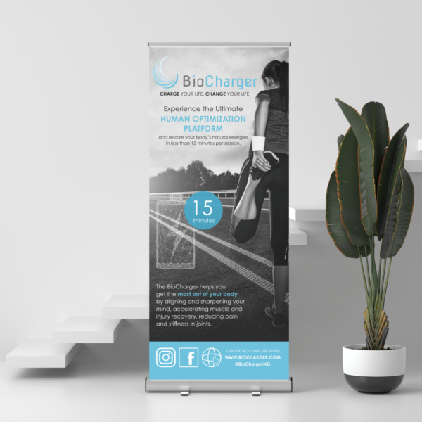 BioCharger Banner In Front of White Modern Staircase Next to the Green Plant
