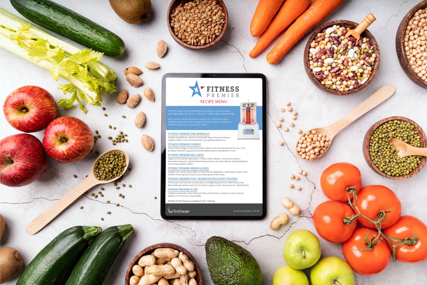 A Tablet with a recipe, surrounded by healthy food ingredients.